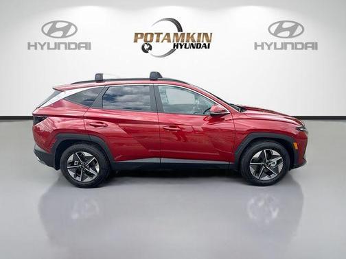 Red 2026 Hyundai TUCSON SEL Premium
