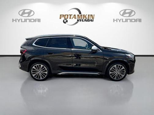 Black Sapphire Metallic 2024 BMW X1 xDrive28i