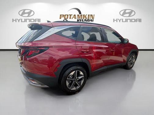 Red 2026 Hyundai TUCSON SEL