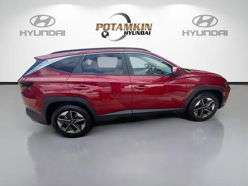 Red 2026 Hyundai TUCSON SEL