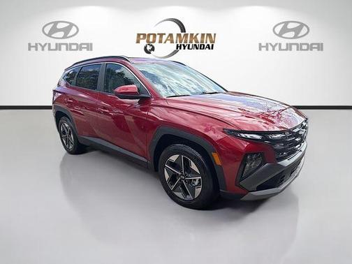 Red 2026 Hyundai TUCSON SEL