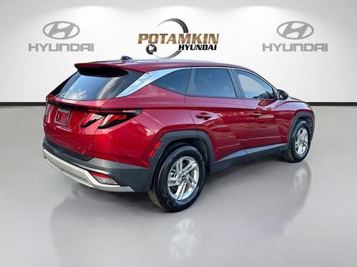 Red 2025 Hyundai TUCSON SE