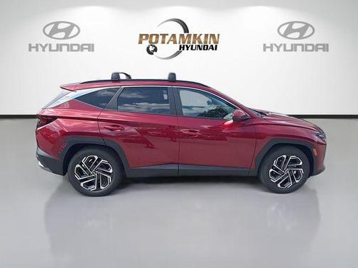 Red 2026 Hyundai TUCSON SEL