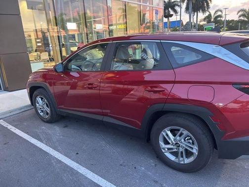 Red 2026 Hyundai TUCSON SE