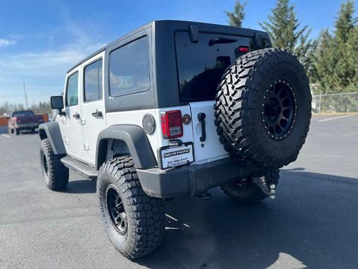 Photo 3 of 34 of 2017 Jeep Wrangler Unlimited Sport