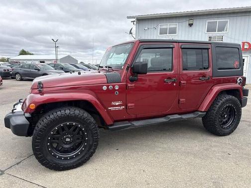 RED 2013 Jeep Wrangler Unlimited Sahara