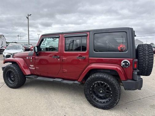 RED 2013 Jeep Wrangler Unlimited Sahara