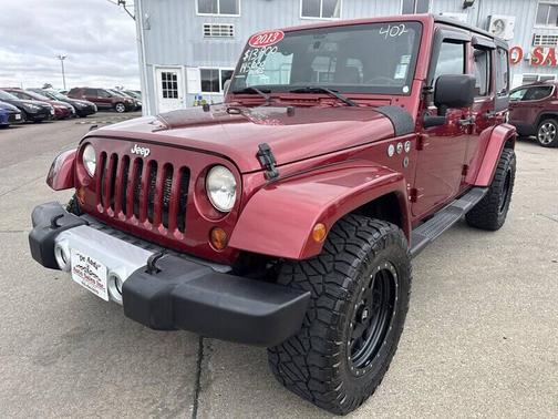RED 2013 Jeep Wrangler Unlimited Sahara