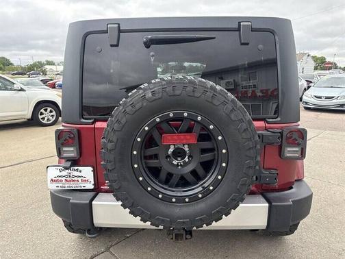 RED 2013 Jeep Wrangler Unlimited Sahara