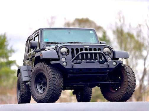 Black 2015 Jeep Wrangler Unlimited Sport