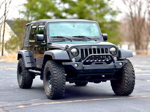 Black 2015 Jeep Wrangler Unlimited Sport