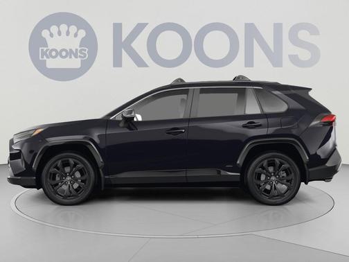 Wind Chill Pearl/Midnight Black Metallic 2023 Toyota RAV4 Hybrid SE