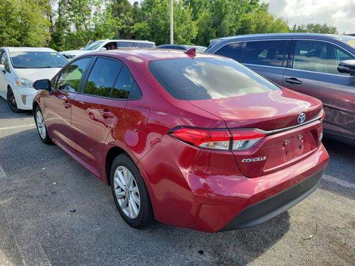 Ruby Flare Pearl 2024 Toyota Corolla Hybrid SE