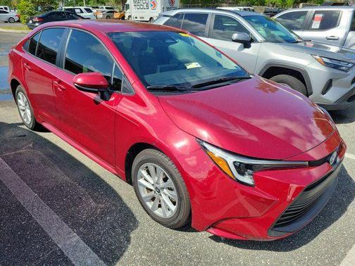Ruby Flare Pearl 2024 Toyota Corolla Hybrid SE