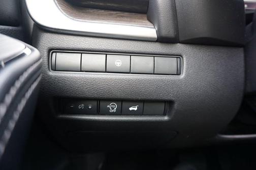 Boulder Gray Pearl/Super Black 2024 Nissan Rogue Platinum