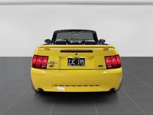 Yellow 2001 Ford Mustang GT