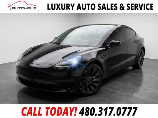 Solid Black 2023 Tesla Model 3 Performance