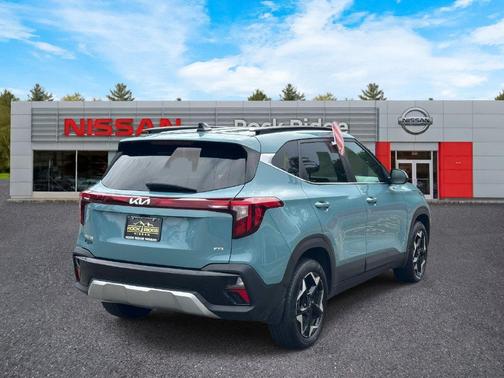 Blue 2024 Kia Seltos EX