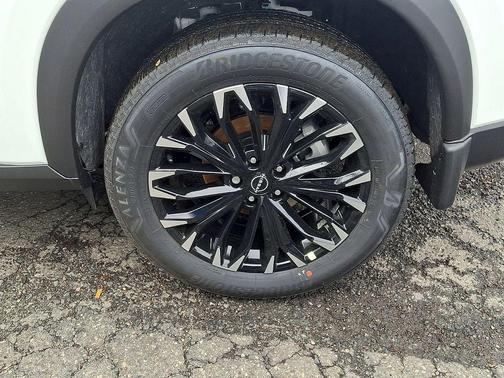 Everest White P 2026 Nissan Rogue Dark Armor
