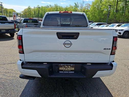 Glacier White 2026 Nissan Frontier SV