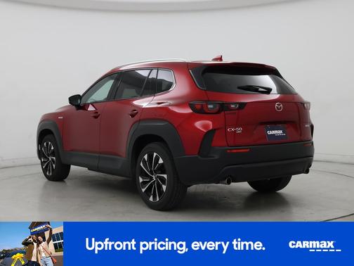 Red 2025 Mazda CX-50 Hybrid Premium Plus