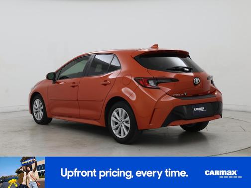 Orange 2025 Toyota Corolla Hatchback SE