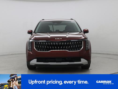 Red 2025 Kia Carnival Hybrid EX