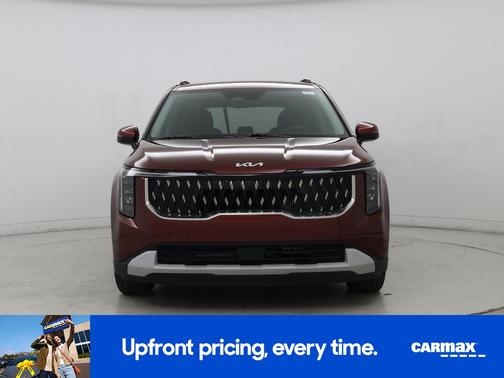 Red 2025 Kia Carnival Hybrid EX