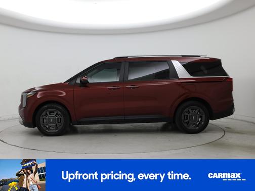Red 2025 Kia Carnival Hybrid EX