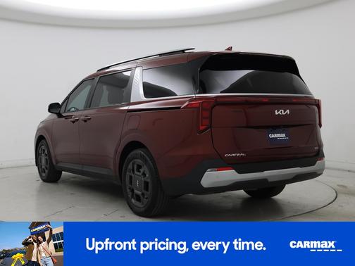 Red 2025 Kia Carnival Hybrid EX
