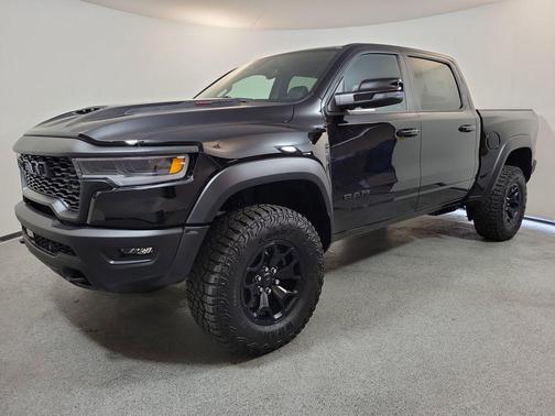 Diamond Black Crystal Pearlcoat 2026 RAM 1500 RHO Crew Cab 4x4 5'7' Box