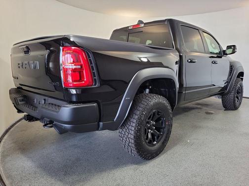 Diamond Black Crystal Pearlcoat 2026 RAM 1500 RHO Crew Cab 4x4 5'7' Box