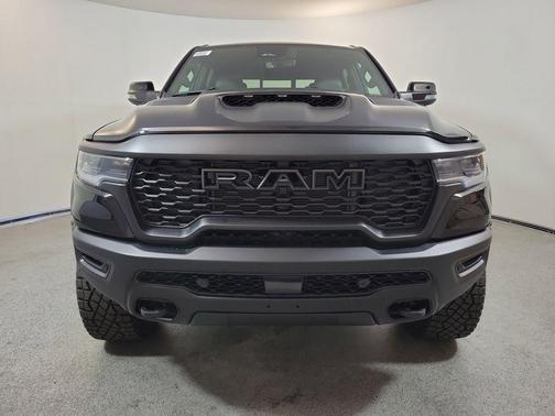 Diamond Black Crystal Pearlcoat 2026 RAM 1500 RHO Crew Cab 4x4 5'7' Box