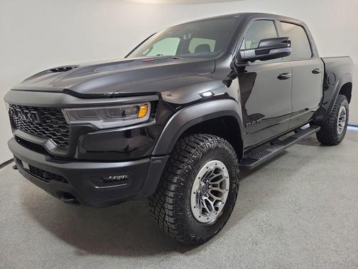 Diamond Black Crystal Pearlcoat 2026 RAM 1500 RHO Crew Cab 4x4 5'7' Box