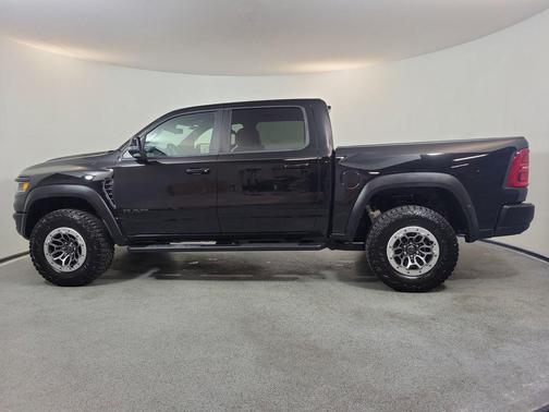 Diamond Black Crystal Pearlcoat 2026 RAM 1500 RHO Crew Cab 4x4 5'7' Box