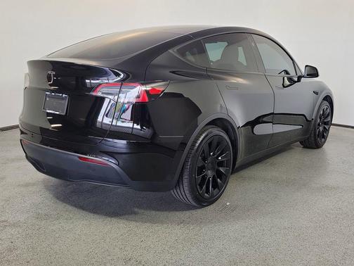 Solid Black 2024 Tesla Model Y Long Range Single Motor Rear-Wheel Drive