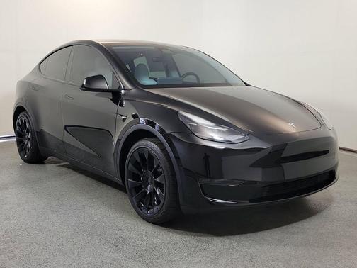 Solid Black 2024 Tesla Model Y Long Range Single Motor Rear-Wheel Drive