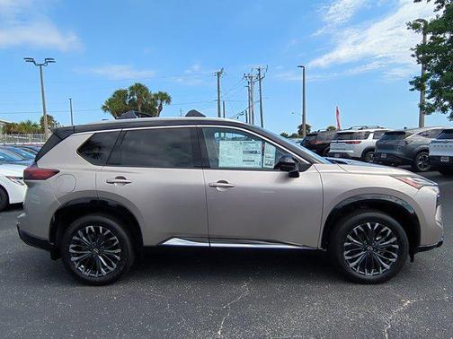 Champagne Silver Metallic/Super Black 2026 Nissan Rogue Platinum