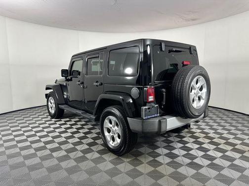 Black Clearcoat 2012 Jeep Wrangler Unlimited Sahara