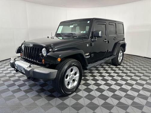 Black Clearcoat 2012 Jeep Wrangler Unlimited Sahara