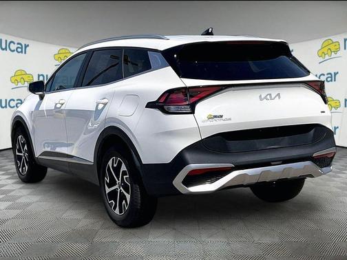 White 2023 Kia Sportage Hybrid EX