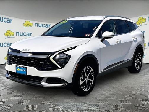 White 2023 Kia Sportage Hybrid EX