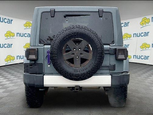 Gray 2015 Jeep Wrangler Unlimited Sahara