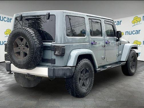 Gray 2015 Jeep Wrangler Unlimited Sahara