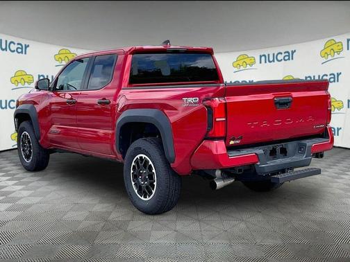 Red 2025 Toyota Tacoma Hybrid TRD