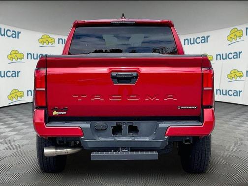 Red 2025 Toyota Tacoma Hybrid TRD