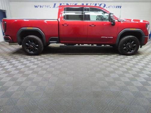 Volcanic Red Tintcoat 2025 GMC Sierra 2500 AT4