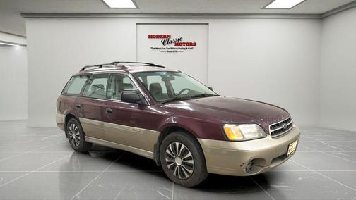 Red 2000 Subaru Outback Base