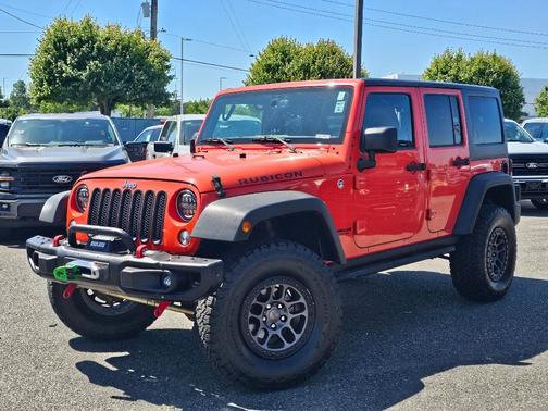 Sunset Orange Pearl 2015 Jeep Wrangler Unlimited Rubicon