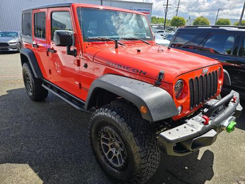 Sunset Orange Pearl 2015 Jeep Wrangler Unlimited Rubicon
